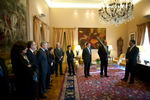 Senior magistrates present greetings in the Palace of Belm